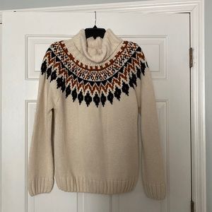 Cream sweater with many and rust pattern